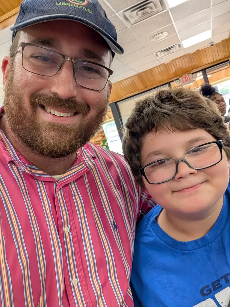 Justin Marks and his son out for lunch on a day off.